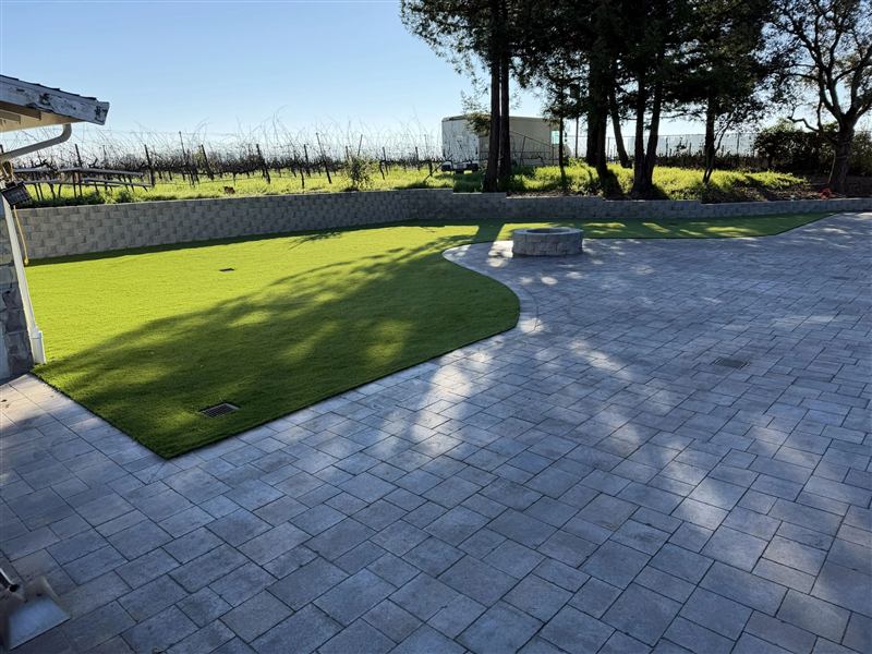 Paver driveway with artificial turf